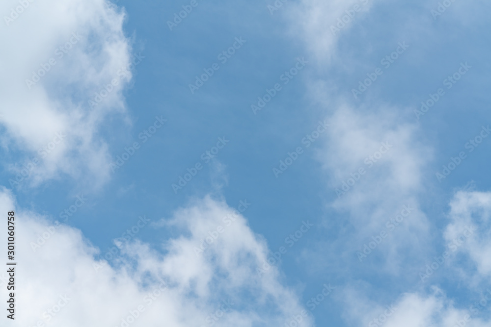 Naklejka White cloud and blue sky background with copy space