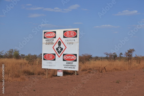 Hazardous sign at the Abandoned Blue Asbestos Mining Town Of WittenoomPilbara Western Australia photo