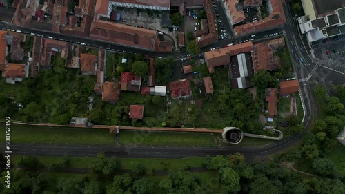 4K Aerial View of Brasov Romania Drone Medieval Town Transylvania Green Forrest photo