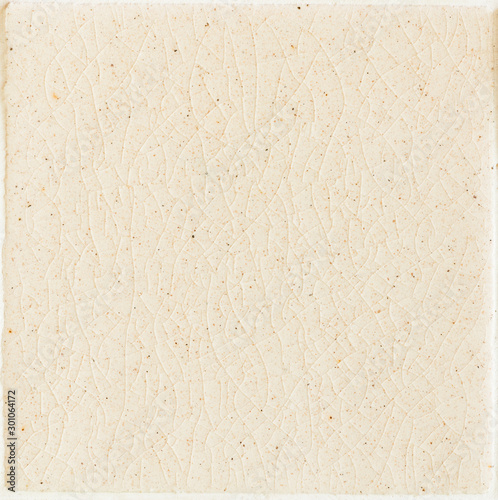 background and texture of stretch marks cracked on white cream glazed tile