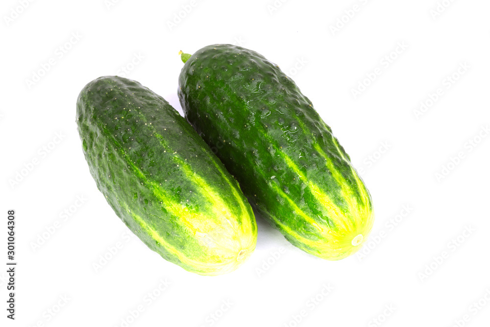green cucumbers on a white background green cucumbers on a white background