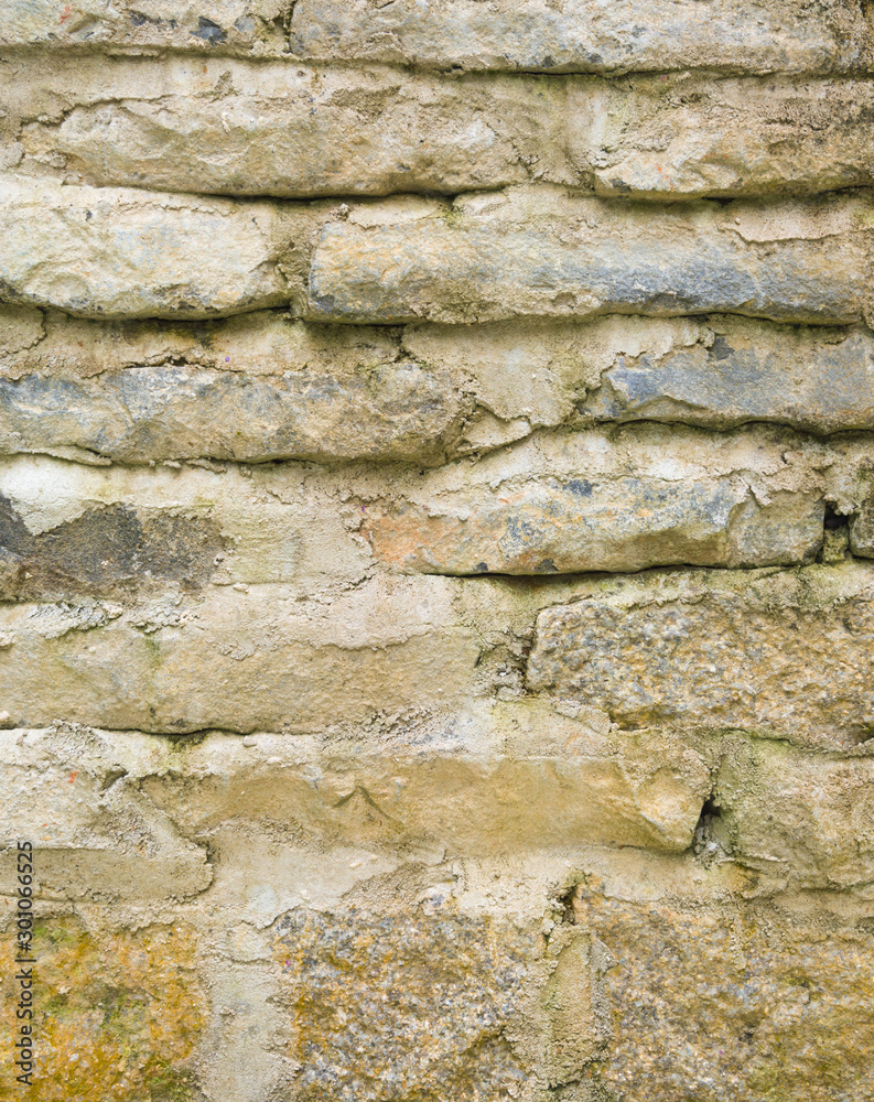 Obraz premium Stone Background of old vintage dirty brick wall with peeling plaster, texture.