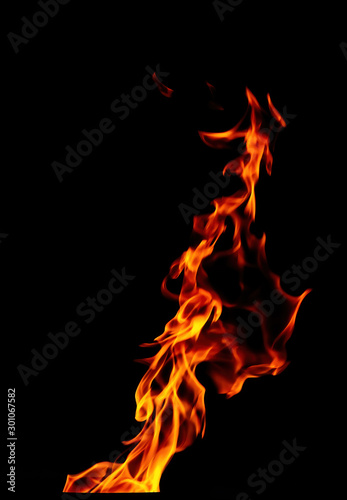 Beautiful yellow, orange and red blaze fire flames. Isolated on black background.