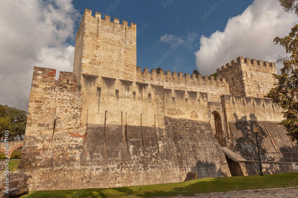 Mighty walls, towers and entrance in Sao Jorge Castle in Lisbon, Portugal