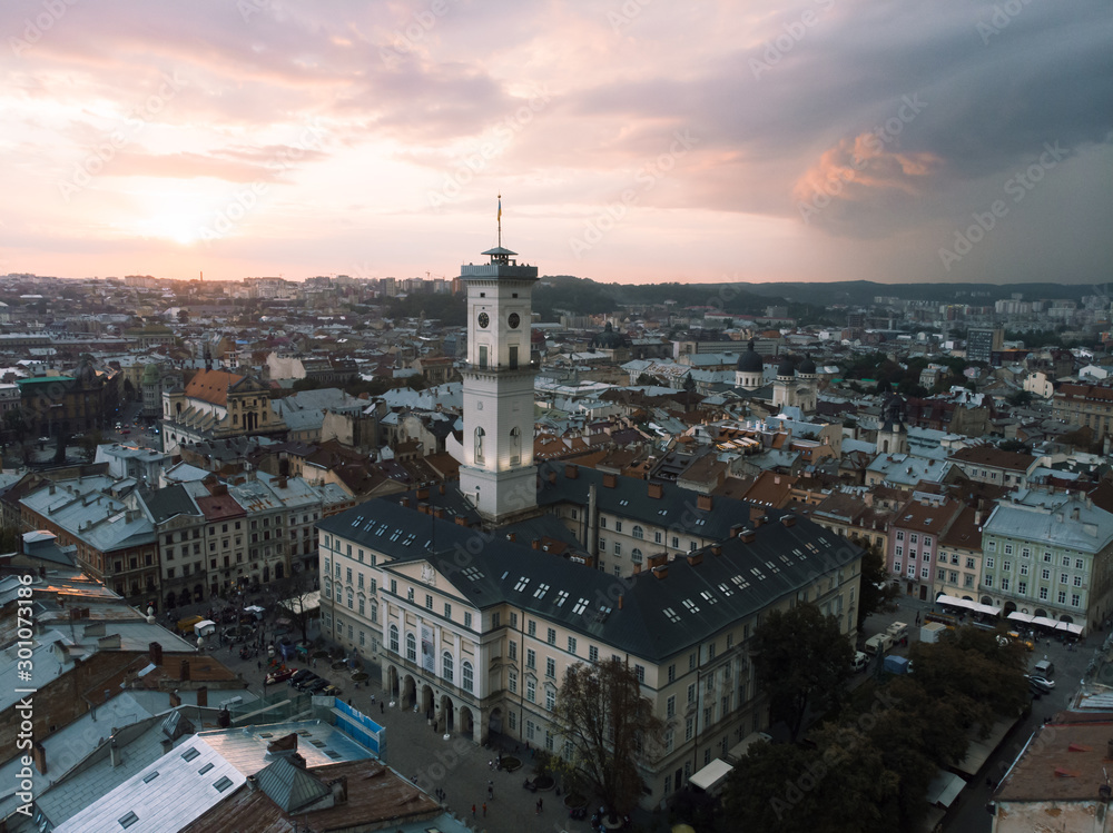 aerial view of lviv bell clock tower on sunset overcast sky