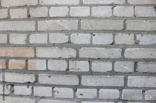 Background brickwork of old white silicate brick