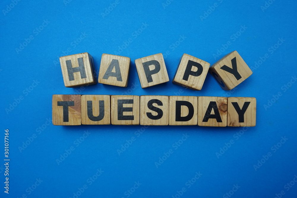 Happy Tuesday text alphabet letter on blue background Happy Tuesday text alphabet letter on blue background