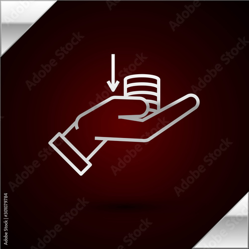Silver line Money on hand icon isolated on dark red background. Palm holds cash with down. Cash salary decrease. Vector Illustration