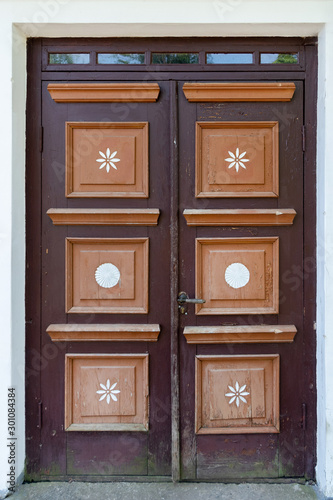 Old wooden doors decorated with ornaments