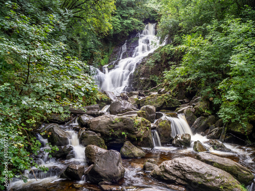 Great forest waterfall in Killarney national park in Ireland