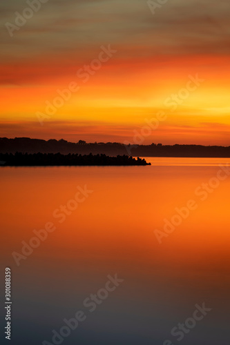 Beautiful orange sunrise at the sea