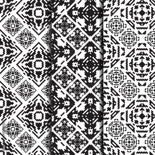 Set of 3 seamless patterns. American Indian style. Vector tribal design for fashion prints. Monochrome backgrounds.