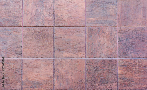 Decorative tiles of brown stone, background.The texture of the stone tiles.