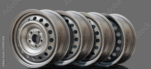 Cuadro en lienzo 4 Steel wheel rim on grey background