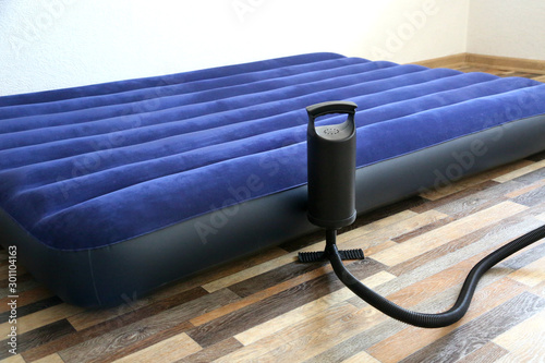  Air bed inflatable mattress and foot pumper good for sleep. Portable and cheap bed. photo