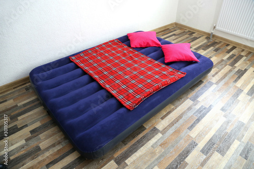 Air bed inflatable mattress good for sleep. Portable and cheap bed. photo