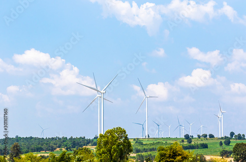 Wind turbine  generators line the hilltops photo