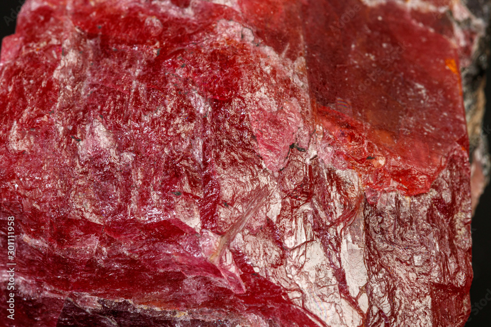 Obraz premium macro mineral Rhodonite stone on a black background