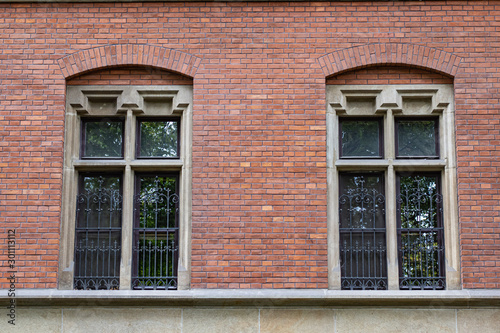 Two Windows on Brick Wall Background