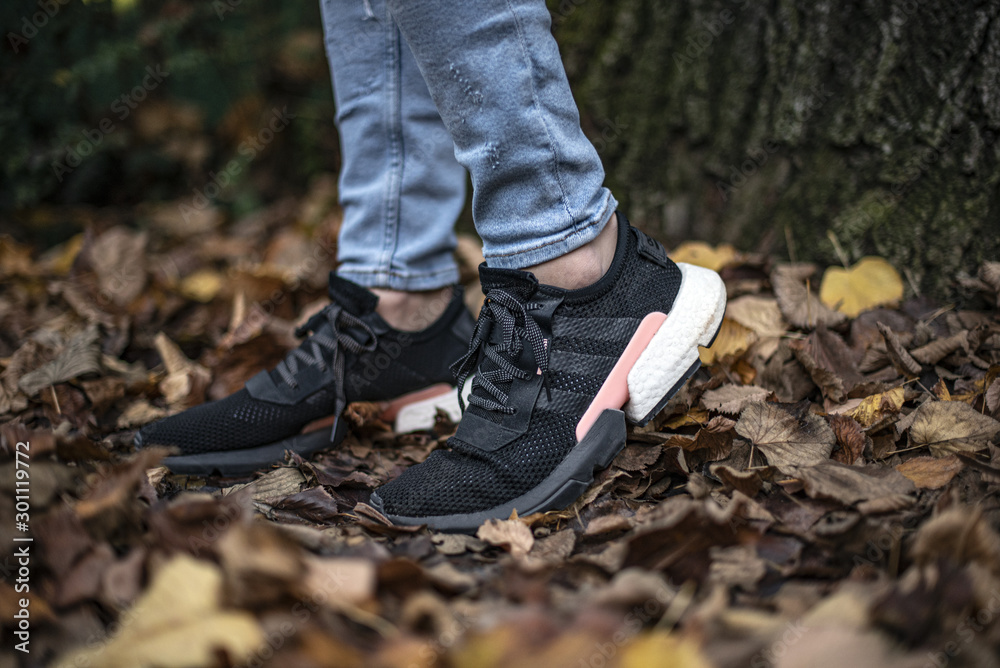 Pavia, Italy - November 1, 2019: Young man wearing Adidas POD-S3.1 shoes  outside - illustrative editorial Stock Photo | Adobe Stock