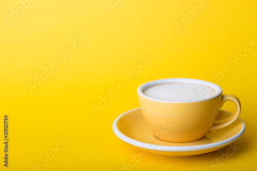 yellow cup on a yellow background