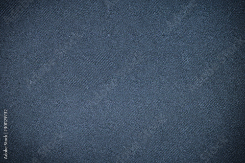 Top view highly detailed resolution fabric dark blue colour abstract vintage style texture dark vignet background, copy space & surface for any design.