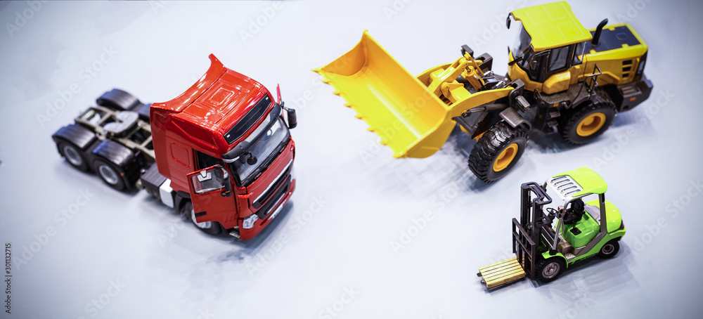 New truck fleet in the container depot at night in blue tone for transportation industry logistics background. New truck fleet in the container depot at night in blue tone for transportation industry logistics background.