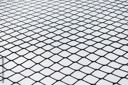 Chain wall background around the playground