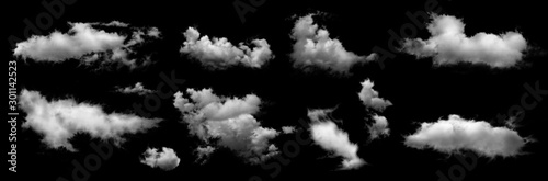 Group of white clouds isolated on black background.