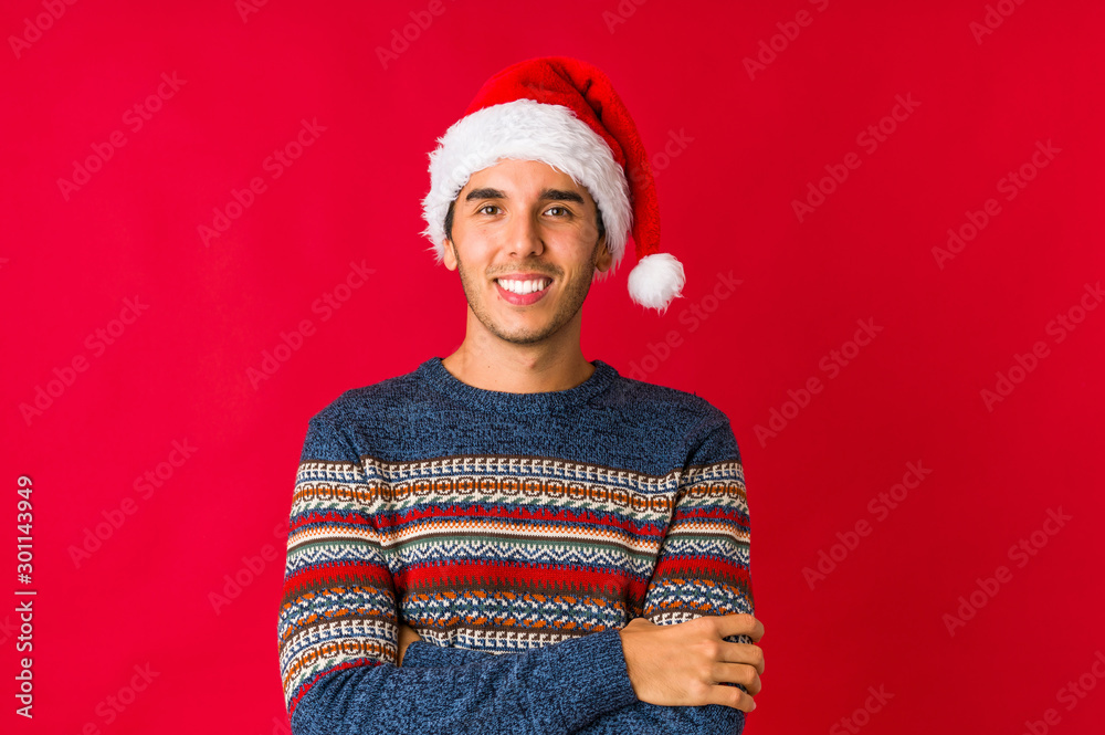 Young man on christmas day dancing and having fun. Young man on christmas day dancing and having fun.