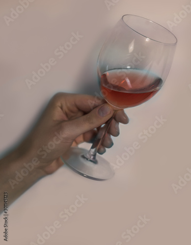 woman holding a wine glass © Ilari