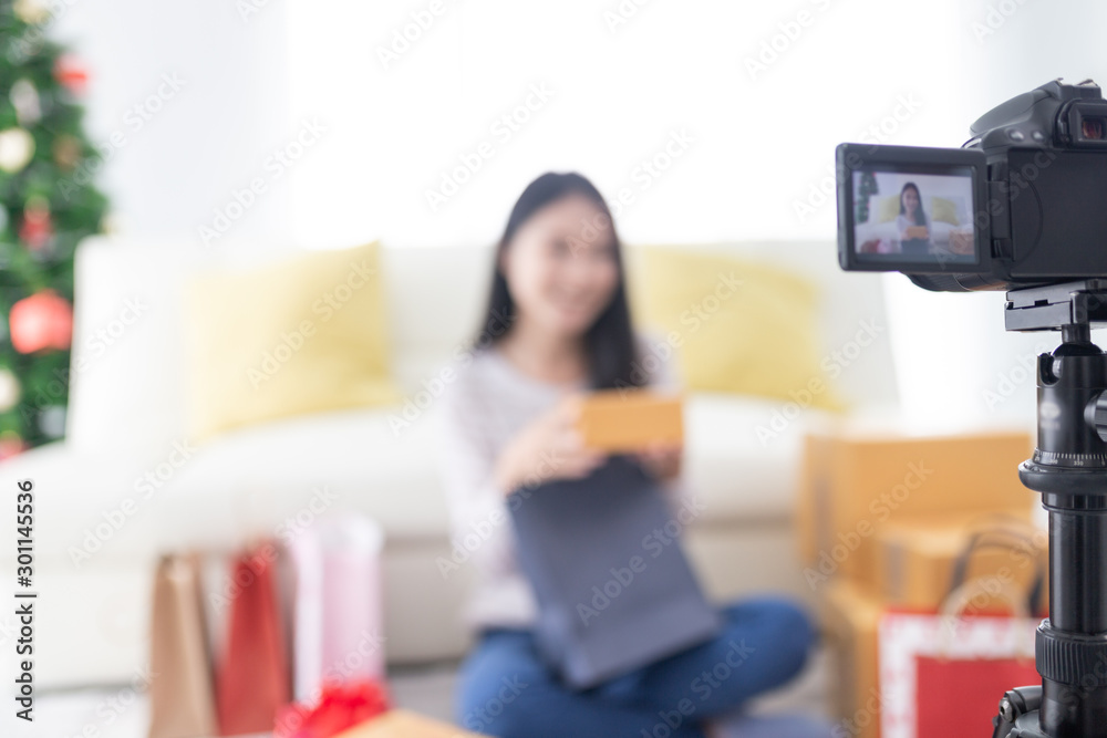 blurred face and camera, asian beauty blogger present and review product on social media, she talk about costume and cosmetic to fan club, she use camera and digital technology work online business blurred face and camera, asian beauty blogger present and review product on social media, she talk about costume and cosmetic to fan club, she use camera and digital technology work online business