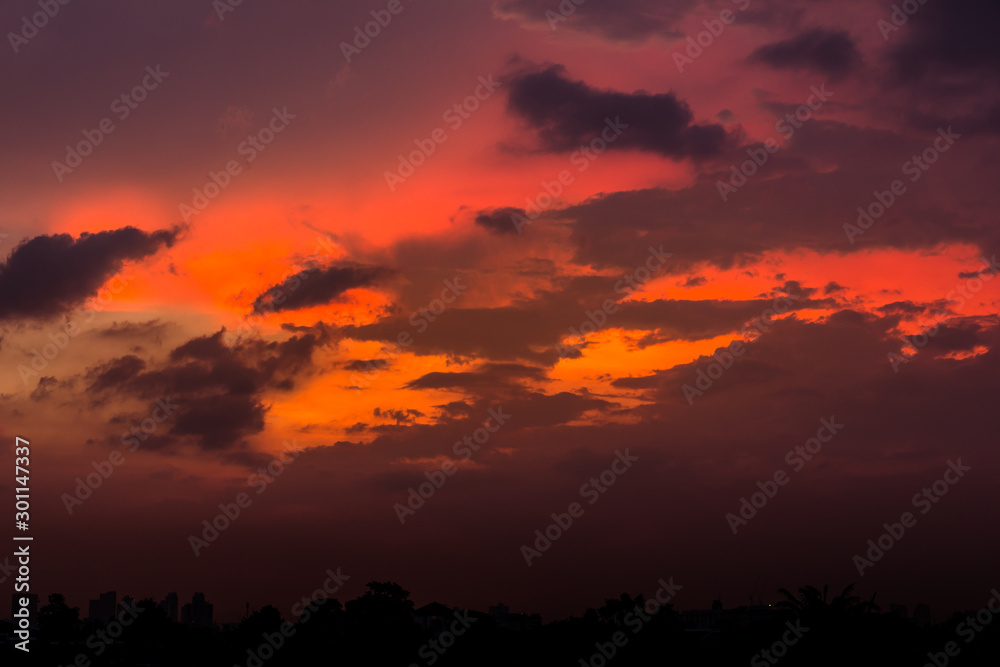 Evening sky with sunset light and colorful clouds as a background Evening sky with sunset light and colorful clouds as a background