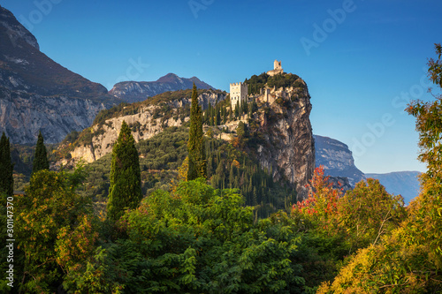 Amazing ruins of Arco Castle on the cliff in northern Italy.