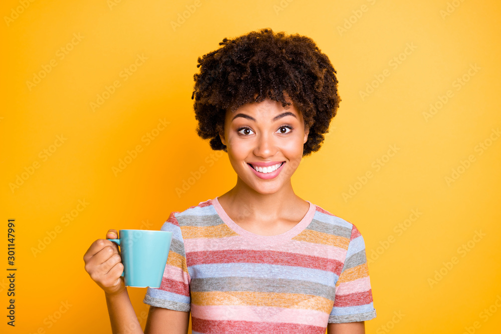 Photo of brown haired cheerful cute sweet charming girlfriend holding cup of tea smiling toothily beaming pleased with taste isolated over vivid color background