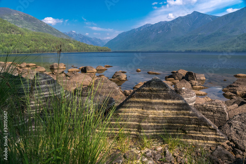 Striped stones on the shore of lake Frolikha photo