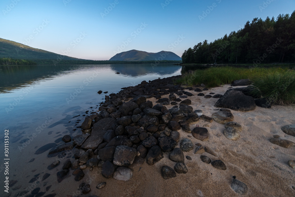 Summer morning on the lake Frolikha. Northern Baikal region Summer morning on the lake Frolikha. Northern Baikal region