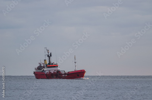 OIL TANKER - Bunker ship with fuel load on the waterway in the sea