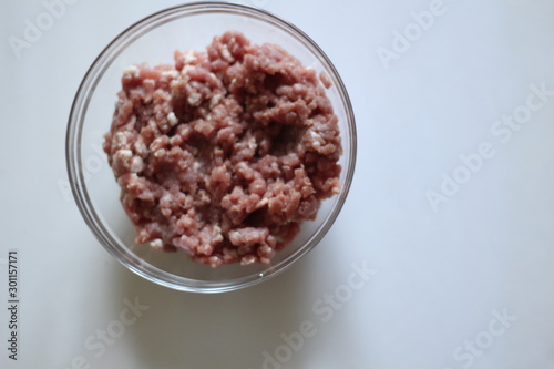 glass plate with minced meat photo