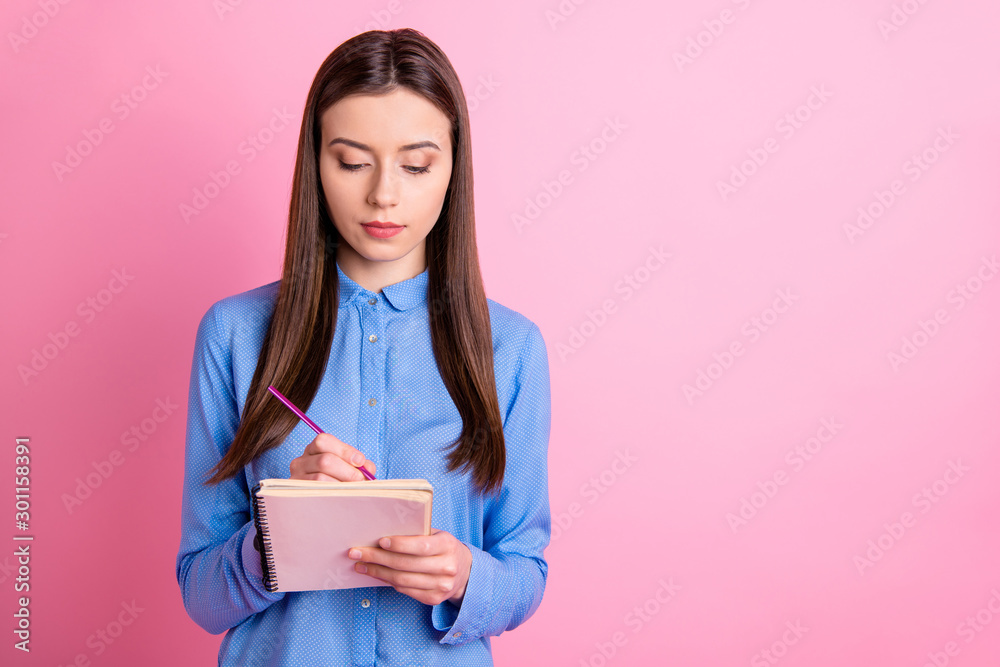 Photo of concentrated serious office manager empty space calculating amount of corporation income wearing blue formal shirt isolated over pink pastel color background Photo of concentrated serious office manager empty space calculating amount of corporation income wearing blue formal shirt isolated over pink pastel color background