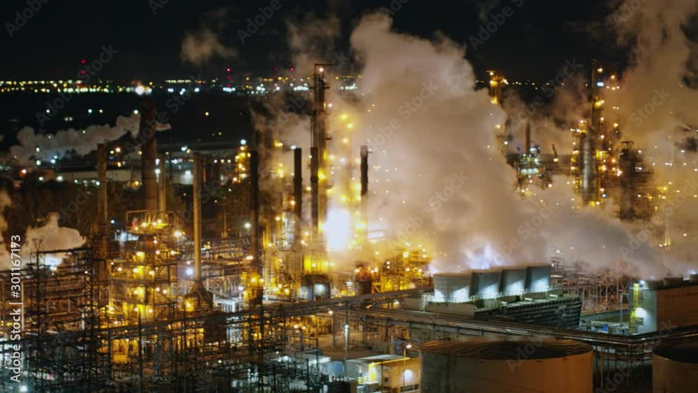 Toledo Ohio Aerial v18 Panning low to high looking at oil refinery industrial cityscape at night - October 2017 Toledo Ohio Aerial v18 Panning low to high looking at oil refinery industrial cityscape at night - October 2017