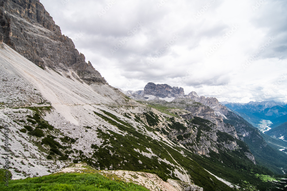 Dolomites, Italy - July, 2019: Amazing panoramic view from Tre Cime over the Dolomite's mountain