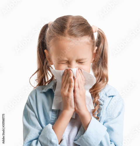 Billede på lærred Little girl suffering from allergy on white background