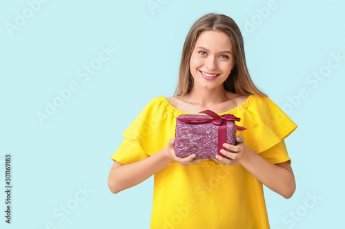 Beautiful woman with gift b...