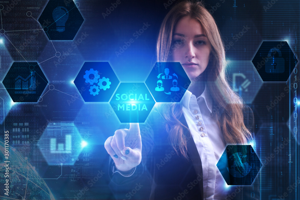 Business, Technology, Internet and network concept. Young businessman working on a virtual screen of the future and sees the inscription: Social media Business, Technology, Internet and network concept. Young businessman working on a virtual screen of the future and sees the inscription: Social media