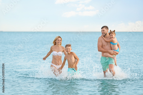 Happy family resting at sea...