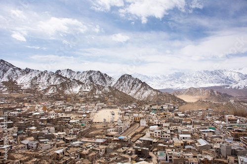 View landscape and cityscape of Leh Ladakh Village with Himalaya mountain range from viewpoint of Leh Stok Palace while winter season in Jammu and Kashmir  India