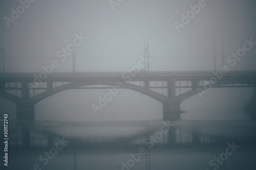 Bridge with fog in mist in the city