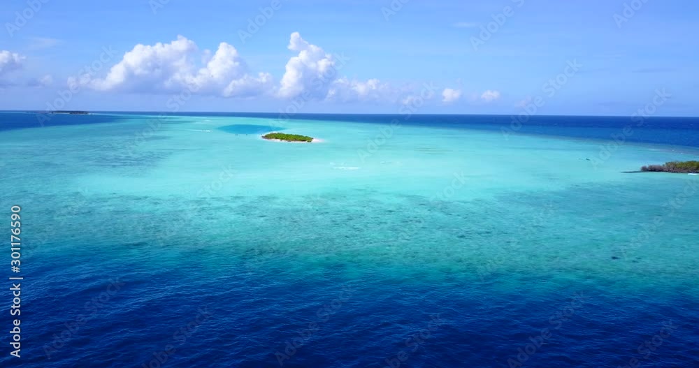 small uninhabited island in Caribbean, shallow water surrounds isolated island, small uninhabited island in Caribbean, shallow water surrounds isolated island,