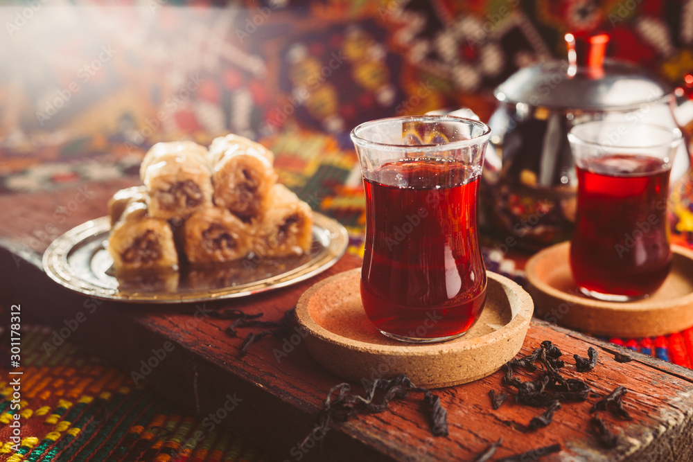 delicious turkish tea and baklava on colorful rug